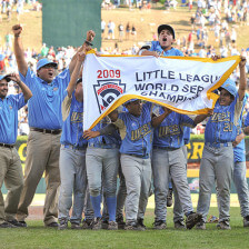 A young baseball team celebrates victory at the Little League World Series